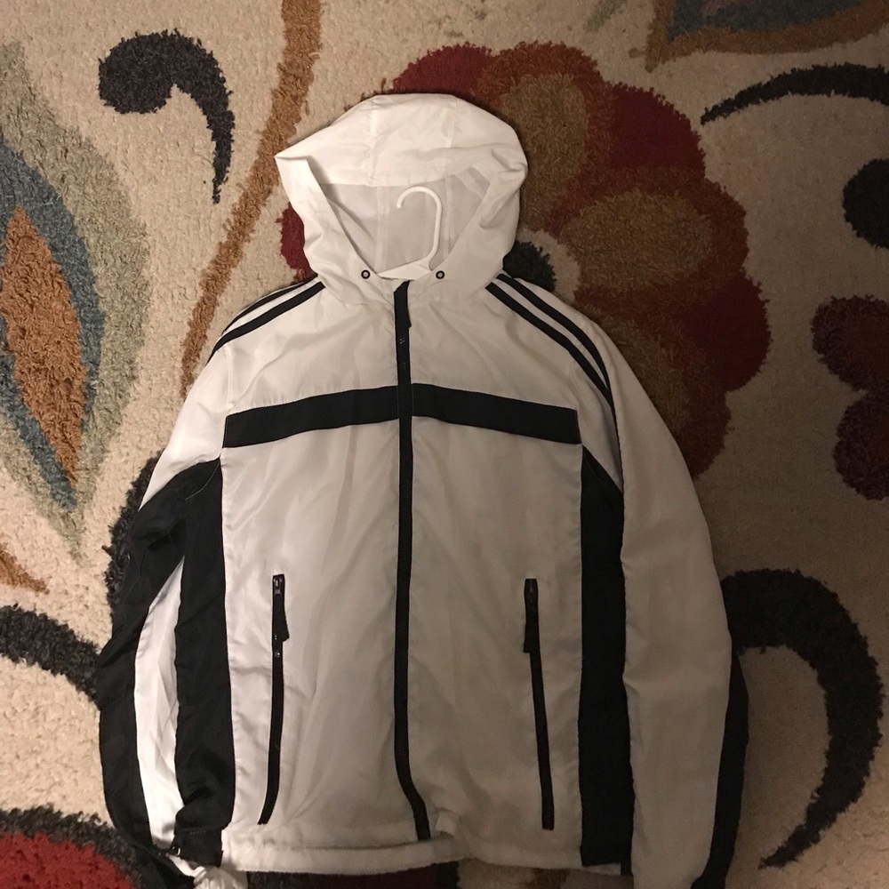 White and black windbreaker